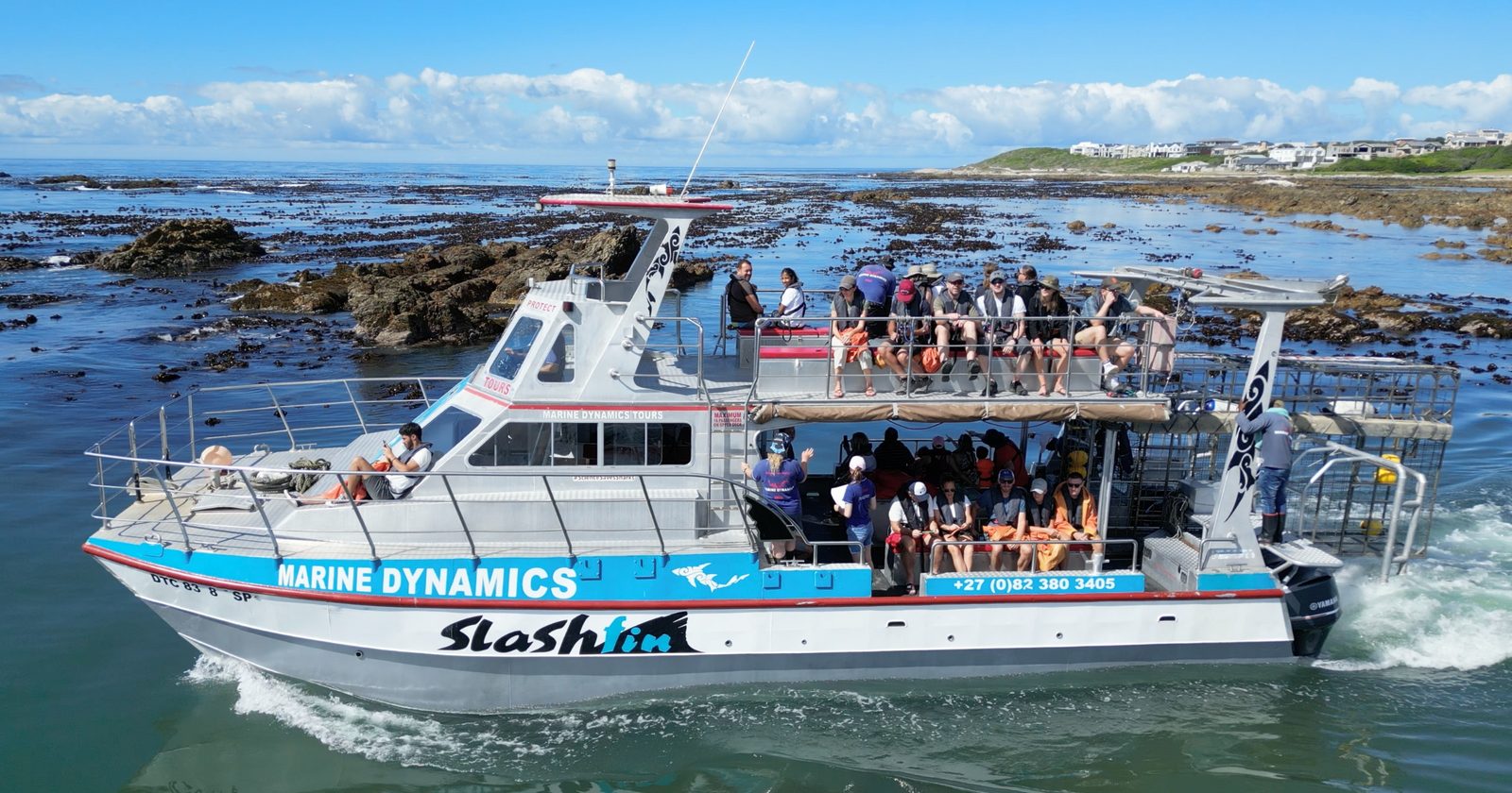 Marine Dynamics tour boat full of guests out on the water